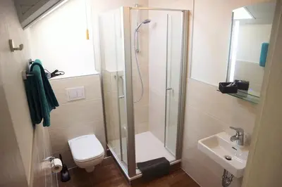 Ein Badezimmer in der Unterkunft Burgunder Suite