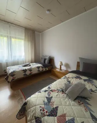 Ein Bett oder Betten in einem Zimmer der Unterkunft Ferienwohnung Wood