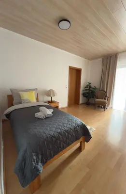 Ein Bett oder Betten in einem Zimmer der Unterkunft Ferienwohnung Wood