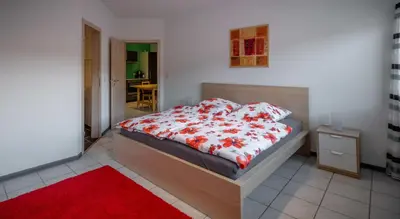 Ein Bett oder Betten in einem Zimmer der Unterkunft Moseltraum