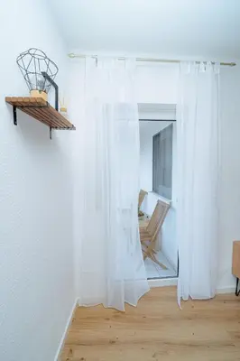Ein Bett oder Betten in einem Zimmer der Unterkunft Schöne, zentral gelegene &renovierte Wohnung in NR