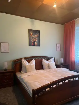 Ein Bett oder Betten in einem Zimmer der Unterkunft Ruheoase in Konz-Könen