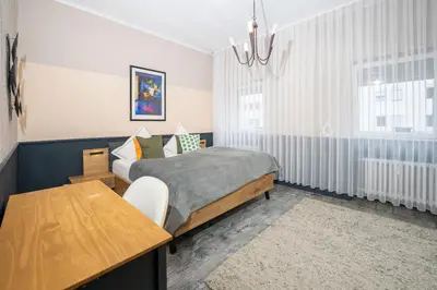 Ein Bett oder Betten in einem Zimmer der Unterkunft Rheinzeit Koblenz