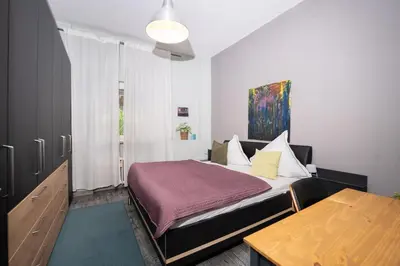 Ein Bett oder Betten in einem Zimmer der Unterkunft Rheinzeit Koblenz