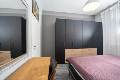 Ein Bett oder Betten in einem Zimmer der Unterkunft Rheinzeit Koblenz