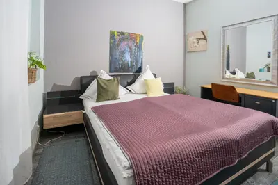 Ein Bett oder Betten in einem Zimmer der Unterkunft Rheinzeit Koblenz