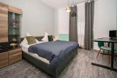 Ein Bett oder Betten in einem Zimmer der Unterkunft Rheinzeit Koblenz