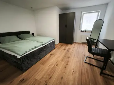 Ein Bett oder Betten in einem Zimmer der Unterkunft FeWo Katharina