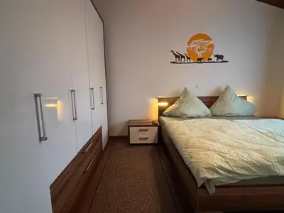 Ein Bett oder Betten in einem Zimmer der Unterkunft Haus am See