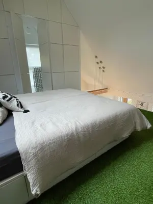 Ein Bett oder Betten in einem Zimmer der Unterkunft Design Maisonette - Architekten Loft