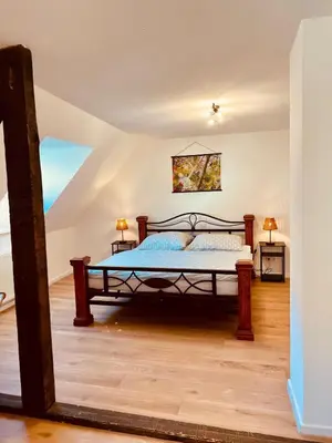 Ein Bett oder Betten in einem Zimmer der Unterkunft Fewo Geib