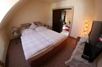 Ein Bett oder Betten in einem Zimmer der Unterkunft Ferienwohnung Wallgaesschen