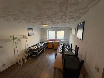 Ein Bett oder Betten in einem Zimmer der Unterkunft Gusenburg B13u Monteur Unterkunft bis 8 Personen