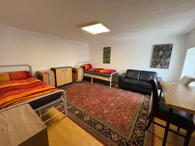 Ein Bett oder Betten in einem Zimmer der Unterkunft Gusenburg B 13o Monteur Wohnung bis 9 Personen