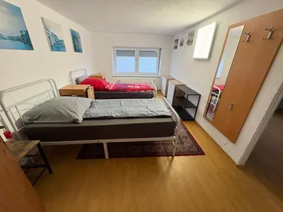 Ein Bett oder Betten in einem Zimmer der Unterkunft Gusenburg B 13o Monteur Wohnung bis 9 Personen
