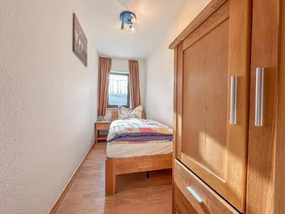 Ein Bett oder Betten in einem Zimmer der Unterkunft Eifelleben Kleinlangenfeld