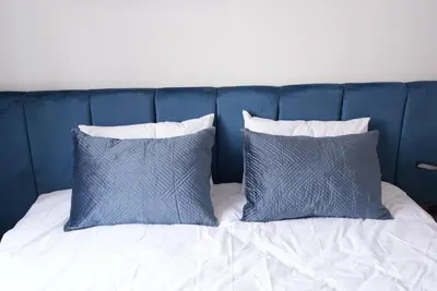 Ein Bett oder Betten in einem Zimmer der Unterkunft Luxury Apartments - Wohnung IA - Elegante Mini-Suite