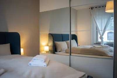 Ein Bett oder Betten in einem Zimmer der Unterkunft Wohlfühl Apartment Rauental - Küche - Wlan