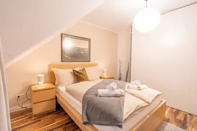 Ein Bett oder Betten in einem Zimmer der Unterkunft Wohlfühl Apartment Rauental - Küche - Wlan
