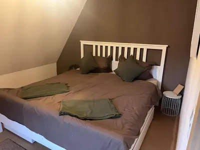 Ein Bett oder Betten in einem Zimmer der Unterkunft Familienhaus für 6 Personen