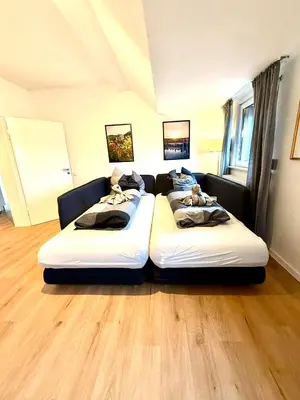 Ein Bett oder Betten in einem Zimmer der Unterkunft KO 2-Zimmer Apartment 58 qm bis zu 4 Personen