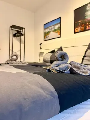 Ein Bett oder Betten in einem Zimmer der Unterkunft KO 2-Zimmer Apartment 58 qm bis zu 4 Personen