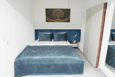 Ein Bett oder Betten in einem Zimmer der Unterkunft Luxury Apartments - Wohnung IB - Business & Komfort