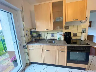 Küche/Küchenzeile in der Unterkunft Romantic apartment with garden