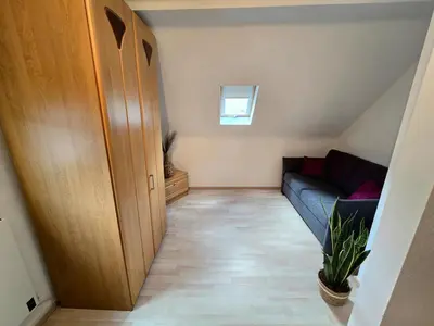 Ein Bett oder Betten in einem Zimmer der Unterkunft Ferienhäuschen in Dickesbach