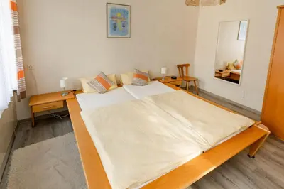 Ein Bett oder Betten in einem Zimmer der Unterkunft Ferienwohnung Fuchsbau