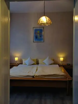 Ein Bett oder Betten in einem Zimmer der Unterkunft Ferienwohnung Fuchsbau