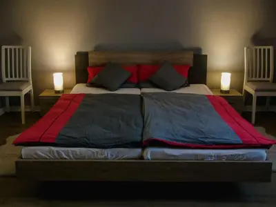 Ein Bett oder Betten in einem Zimmer der Unterkunft Ferienwohnung Fuchsbau