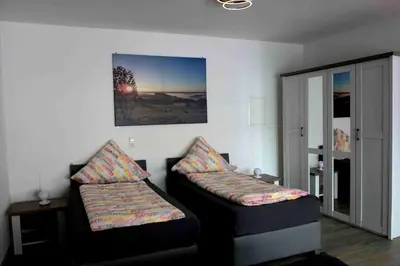 Ein Bett oder Betten in einem Zimmer der Unterkunft Race & Rest Apartments