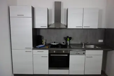 Küche/Küchenzeile in der Unterkunft Race & Rest Apartments