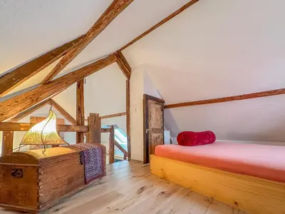 Ein Bett oder Betten in einem Zimmer der Unterkunft Harreshof