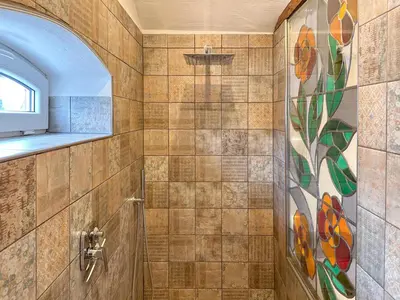 Ein Badezimmer in der Unterkunft Harreshof