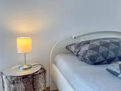 Ein Bett oder Betten in einem Zimmer der Unterkunft Harreshof