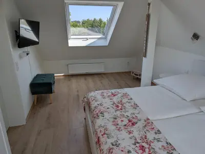 Ein Bett oder Betten in einem Zimmer der Unterkunft Ferienhaus MAWO 4 Sterne