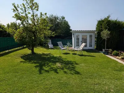 Ein Garten an der Unterkunft Ferienhaus MAWO 4 Sterne