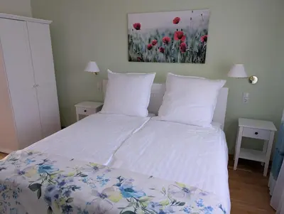 Ein Bett oder Betten in einem Zimmer der Unterkunft Ferienhaus MAWO 4 Sterne