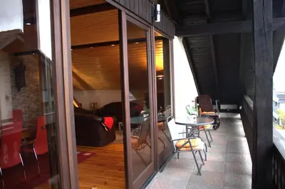 Ein Sitzbereich in der Unterkunft Moderne Ferienwohnung in Mastershausen - 140qm