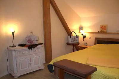 Ein Bett oder Betten in einem Zimmer der Unterkunft Moderne Ferienwohnung in Mastershausen - 140qm
