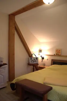 Ein Bett oder Betten in einem Zimmer der Unterkunft Moderne Ferienwohnung in Mastershausen - 140qm