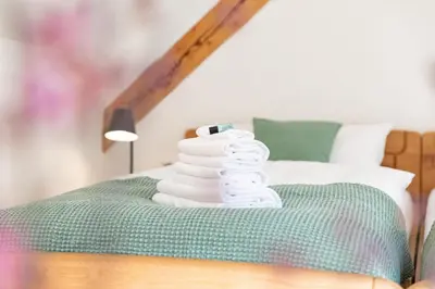 Ein Bett oder Betten in einem Zimmer der Unterkunft Ferienhaus Immerather Hof