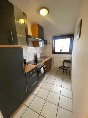 Küche/Küchenzeile in der Unterkunft Ruhige Dachgeschosswohnung in Nickenich