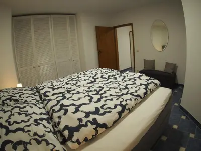 Ein Bett oder Betten in einem Zimmer der Unterkunft Am Waldrand