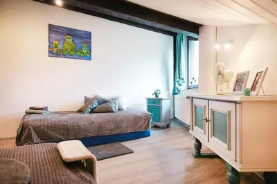 Ein Bett oder Betten in einem Zimmer der Unterkunft Südhöhe-Domizil