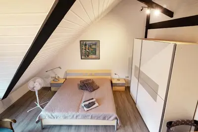 Ein Bett oder Betten in einem Zimmer der Unterkunft Südhöhe-Domizil