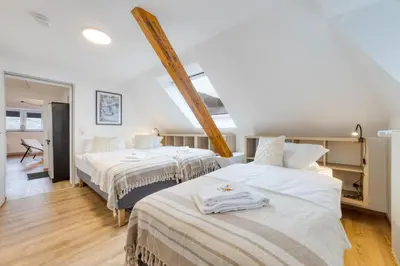Ein Bett oder Betten in einem Zimmer der Unterkunft VonMos Burg&Moselblick
