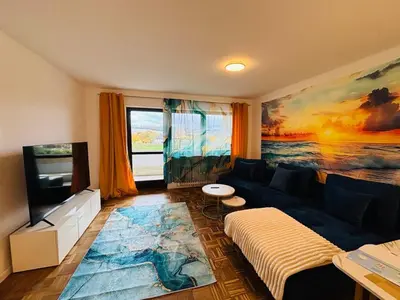 Ein Sitzbereich in der Unterkunft Spacious 72 sqm Moselblick apartment & top connection